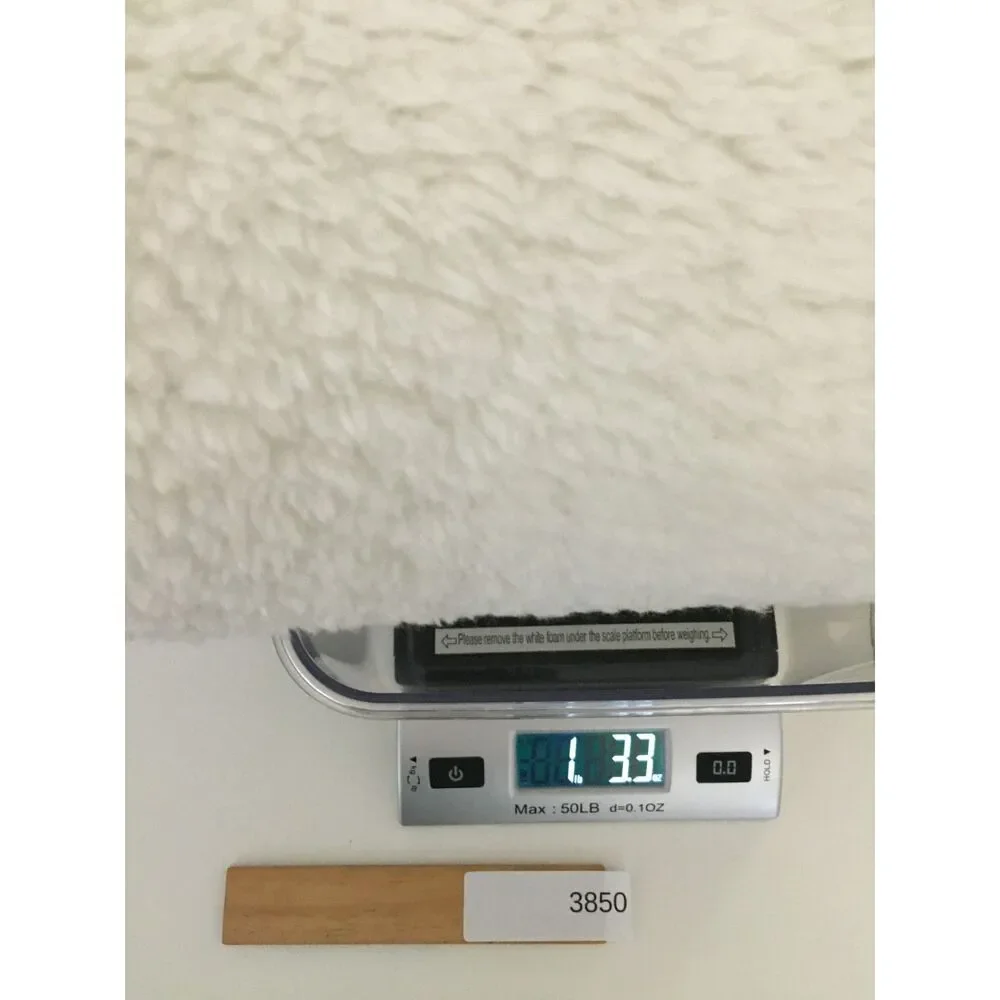 Soft and cozy white faux sheepskin / faux fur accent rug